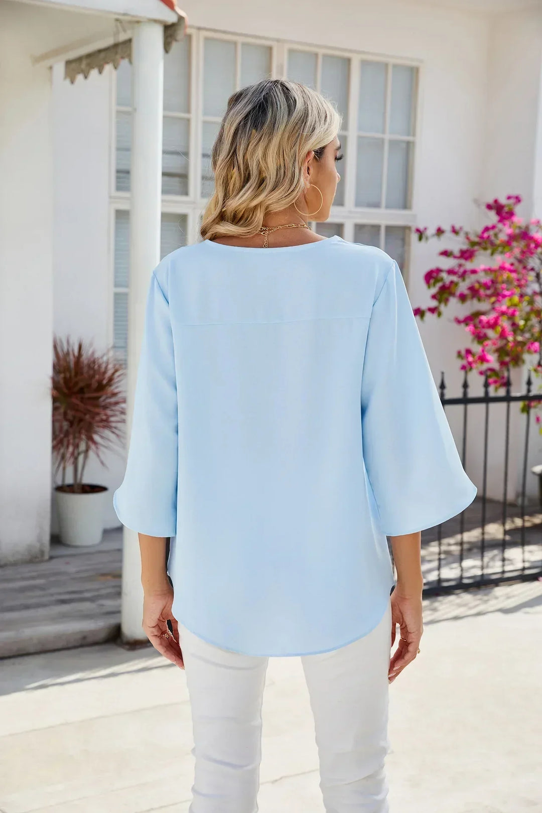 Einzigartige Bluse mit V-Ausschnitt