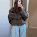 Damen Oversized Regenjacke mit Kapuze und modischem Schnitt
