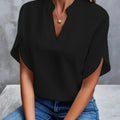 Bluse mit V-Ausschnitt und Seitenschlitzen