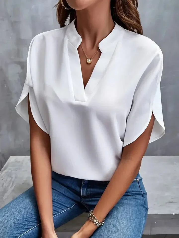 Bluse mit V-Ausschnitt und Seitenschlitzen