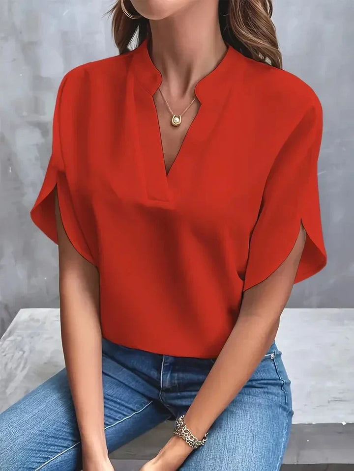 Bluse mit V-Ausschnitt und Seitenschlitzen