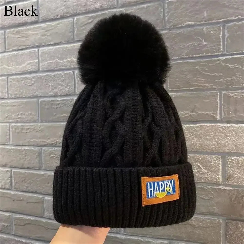 Bommelmütze mit Ohrenklappen – Warme Strickmütze für Damen im Winter