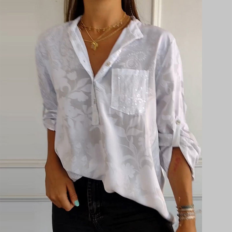 Elegante bedruckte Bluse mit Vordertasche