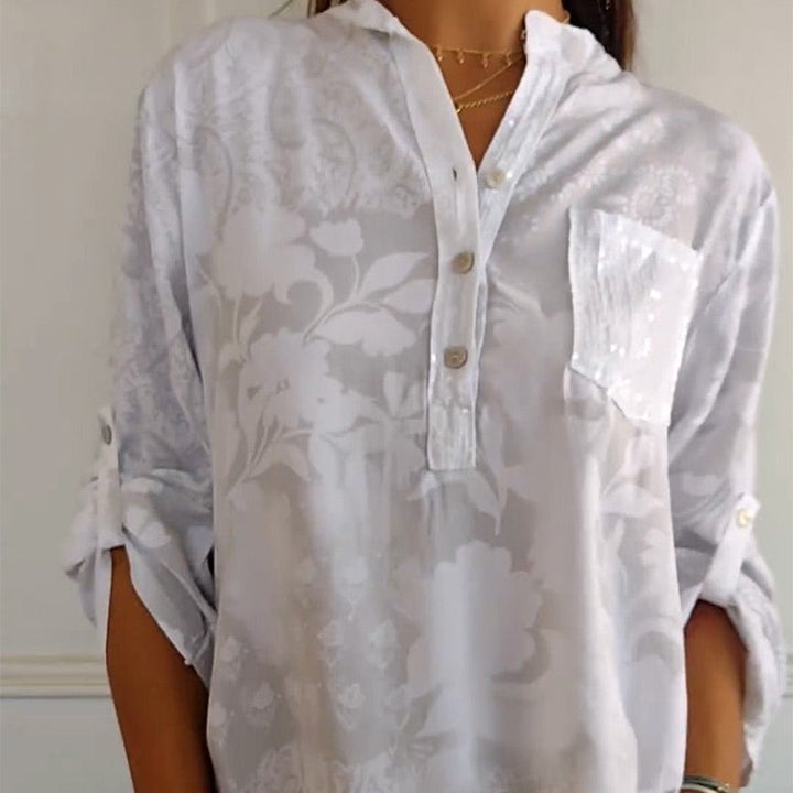 Elegante bedruckte Bluse mit Vordertasche
