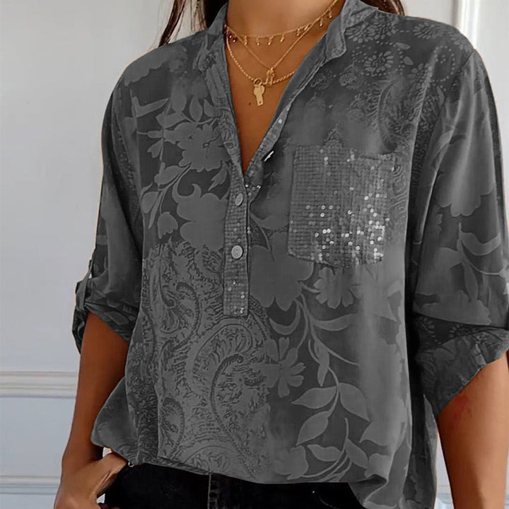 Elegante bedruckte Bluse mit Vordertasche