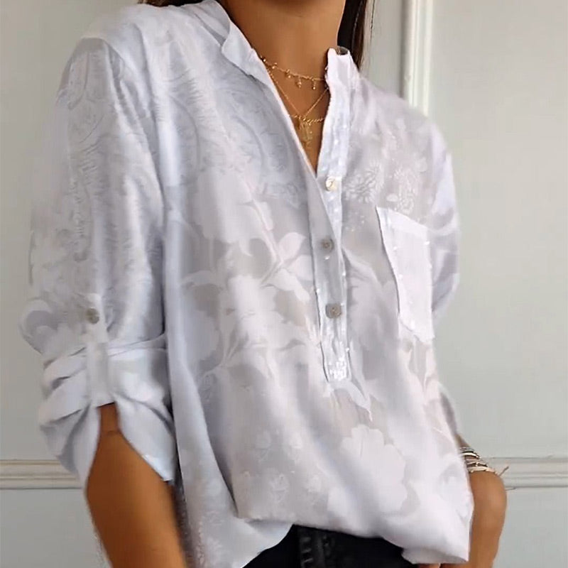 Elegante bedruckte Bluse mit Vordertasche
