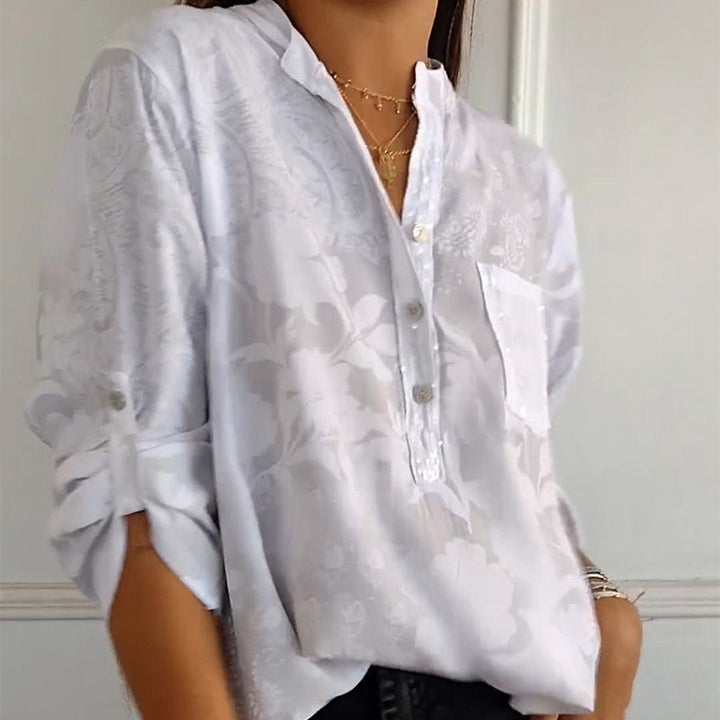 Elegante bedruckte Bluse mit Vordertasche