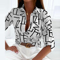 Bluse mit umgeschlagenem Kragen